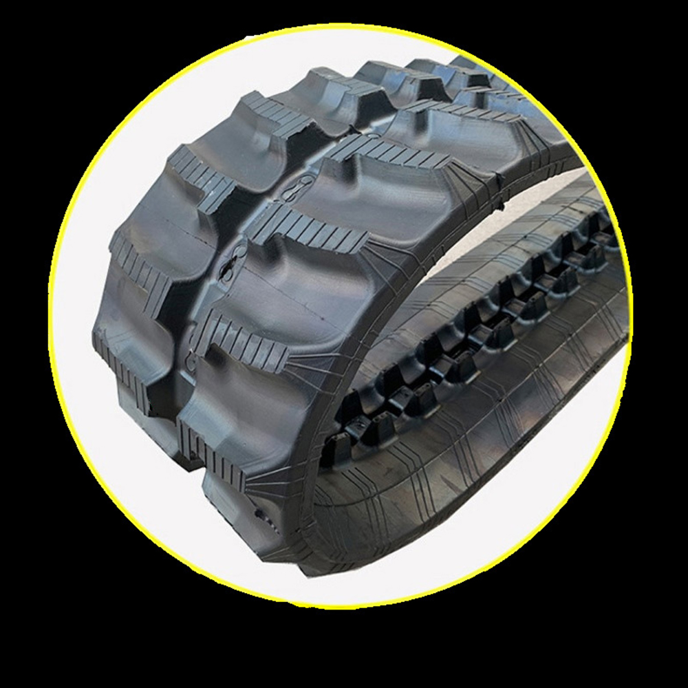 China Factory for Front Loader Bucket Teeth - Excavator natural rubber track four wheel one belt chassis accessories OEM custom rubber track – China Construction